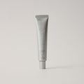 Pfect-A ProAge Controlled Release Retinol Cream 1,000ppm in a sleek silver tube — anti-aging retinol cream with peptides and hyaluronic acid for fine lines and firmness, on a neutral background